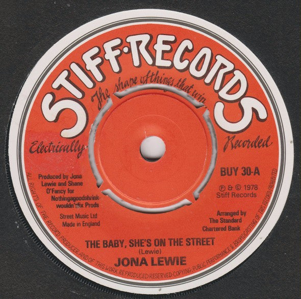 Jona Lewie : The Baby, She's On The Street (7", Single, Red)