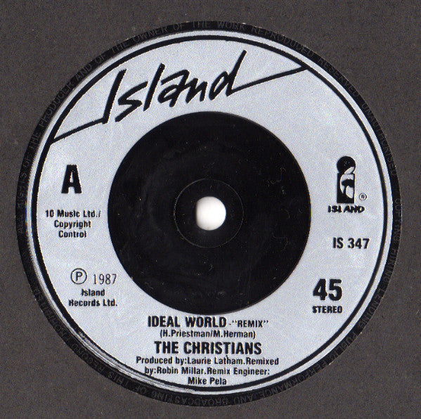 The Christians : Ideal World (Remix) (7", Single, Sil)