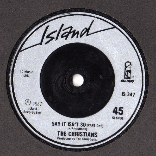 The Christians : Ideal World (Remix) (7", Single, Sil)