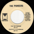 The Pioneers (16) : The Toy Parade (7", Single)