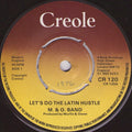 M & O Band : Let's Do The Latin Hustle (7", Single)
