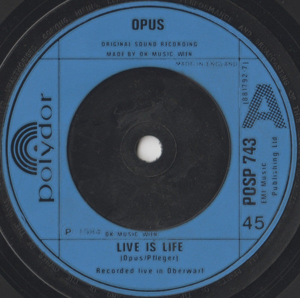 Opus : Live Is Life / Up And Down (7", Single, Blu)