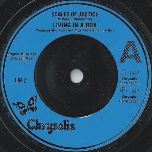 Living In A Box : Scales Of Justice (7", Single, Blu)
