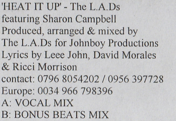 The L.A.D.S. Featuring Sharron Campbell : Heat It Up (12", W/Lbl)