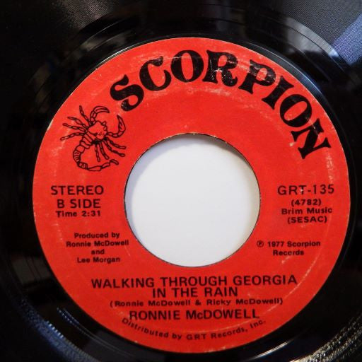 Ronnie McDowell : The King Is Gone (7", Single, Styrene)
