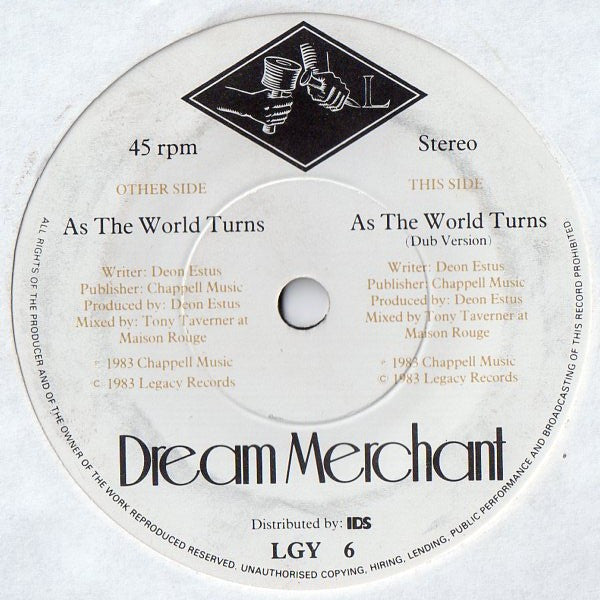 Dream Merchant : As The World Turns (7", Single, Com)