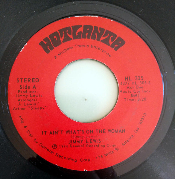 Jimmy Lewis : It Ain't What's On The Woman (7", Single, Styrene, PRC)