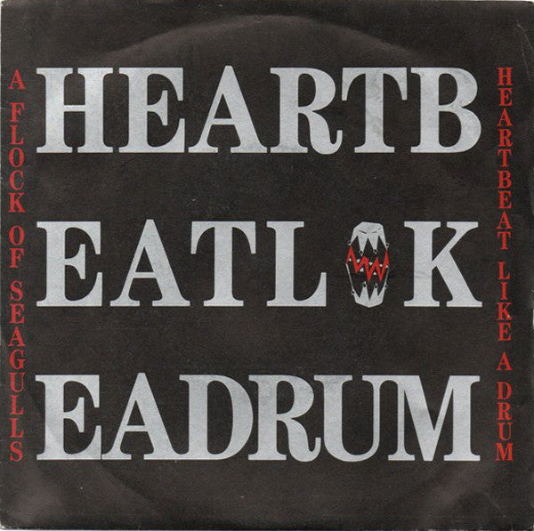 A Flock Of Seagulls : Heartbeat Like A Drum (7", Single)