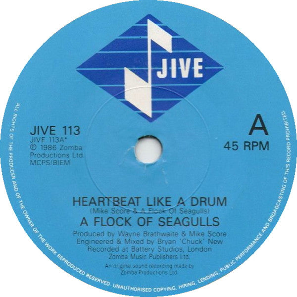 A Flock Of Seagulls : Heartbeat Like A Drum (7", Single)