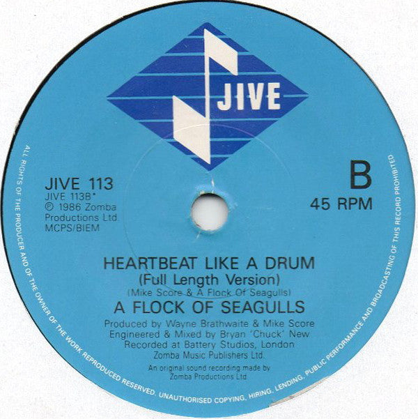 A Flock Of Seagulls : Heartbeat Like A Drum (7", Single)