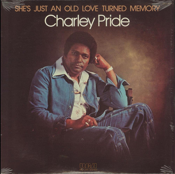 Charley Pride : She's Just An Old Love Turned Memory (LP, Album, Ora)