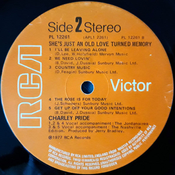 Charley Pride : She's Just An Old Love Turned Memory (LP, Album, Ora)