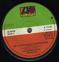 The Manhattan Transfer : On A Little Street In Singapore (7", Single, Dam)