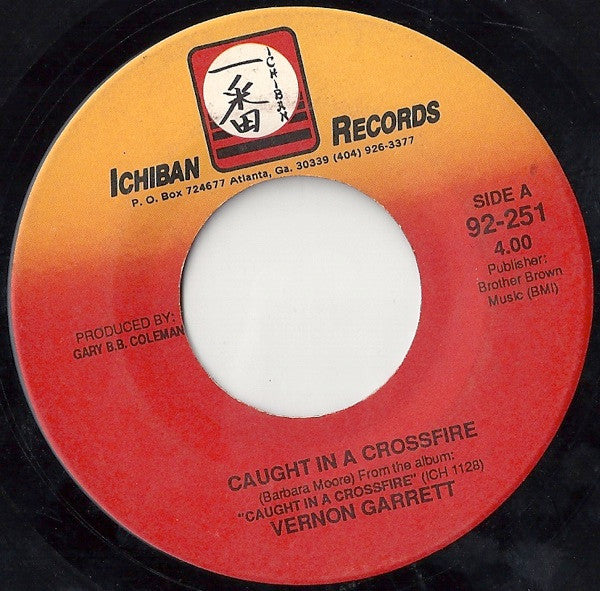 Vernon Garrett : Caught In A Crossfire (7", Single)