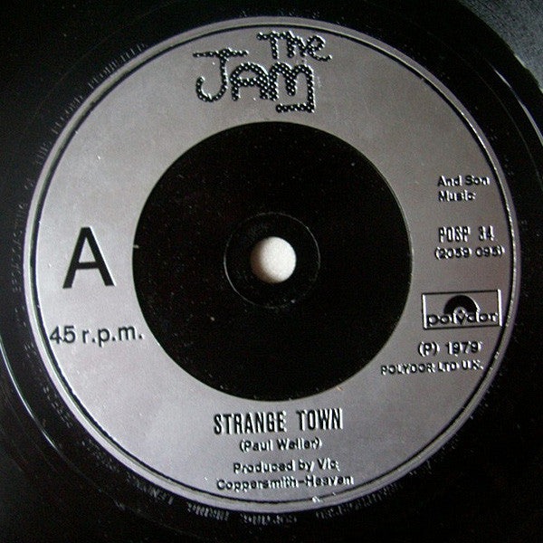 The Jam : Strange Town (7", Single, Pho)