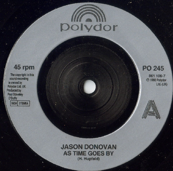 Jason Donovan : As Time Goes By (7", Single, Inj)