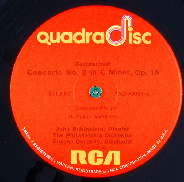 Sergei Vasilyevich Rachmaninoff by Arthur Rubinstein and Eugene Ormandy Conducts The Philadelphia Orchestra : Piano Concerto No. 2 (LP, Quad)