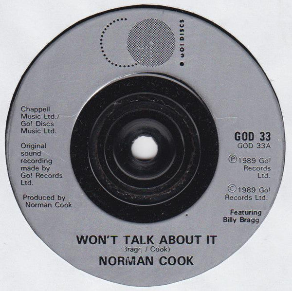 Norman Cook : Won't Talk About It / Blame It On The Bassline (7", Single, Sil)
