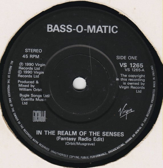 Bassomatic : In The Realm Of The Senses (7", Single)