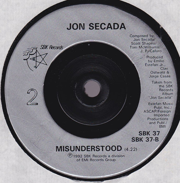 Jon Secada : Do You Believe In Us (7", Single)