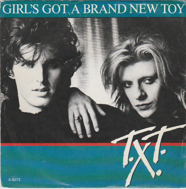 T.X.T. : Girl's Got A Brand New Toy (7")
