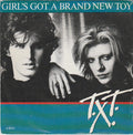 T.X.T. : Girl's Got A Brand New Toy (7")