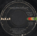 Tyrone Davis : A Woman Needs To Be Loved (7", Styrene, Pit)