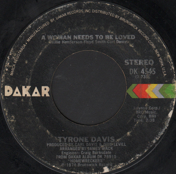 Tyrone Davis : A Woman Needs To Be Loved (7", Styrene, Pit)